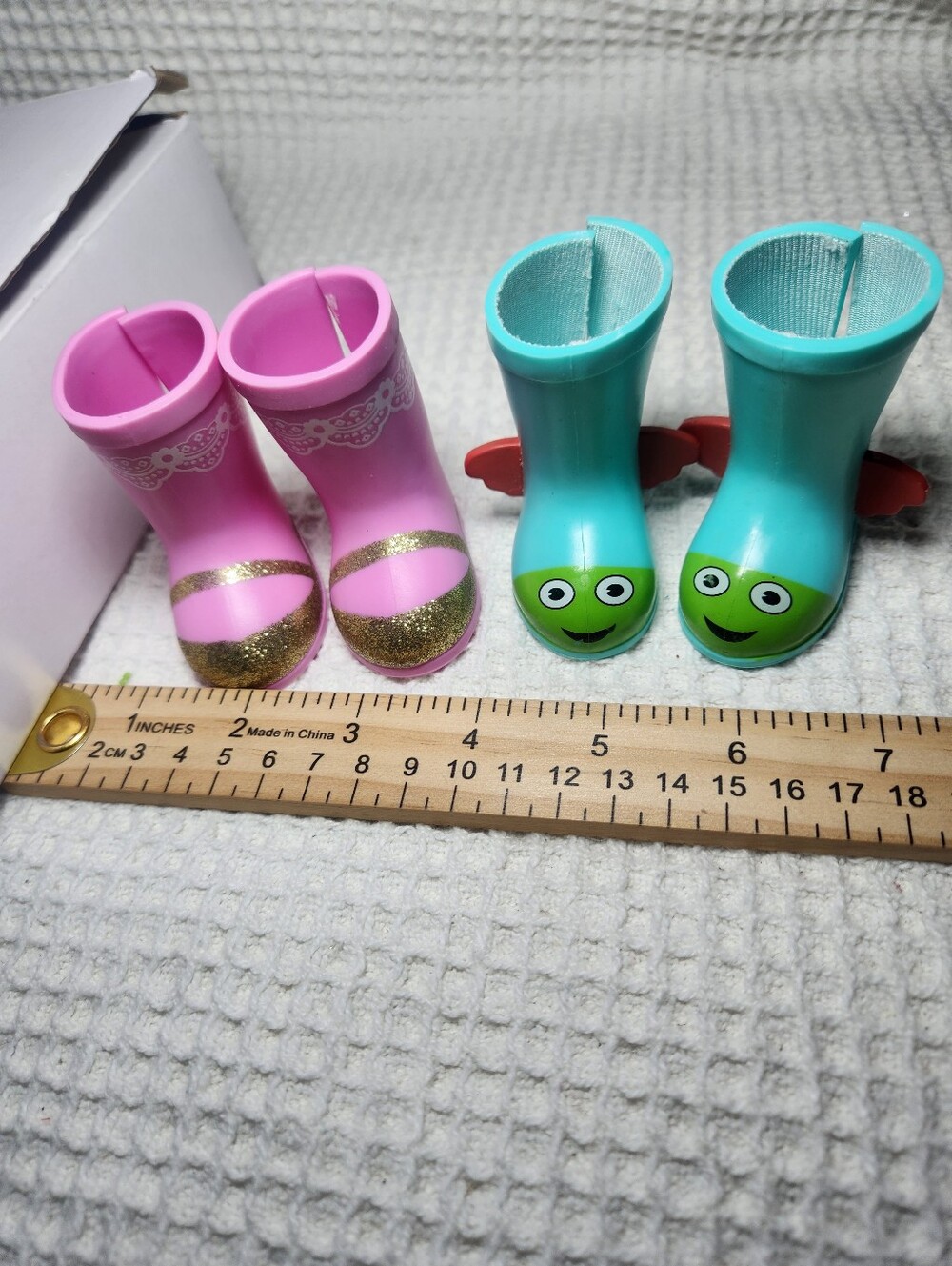 Two pairs of American Girl doll rain boots